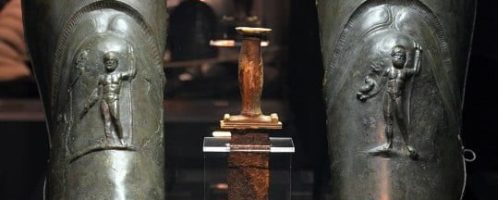 A dagger with a pair of gladiator greaves