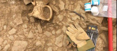 Archaeologists have found an ancient pitcher under Roman road