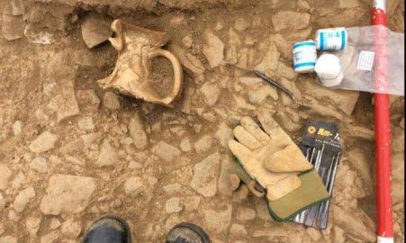 Archaeologists have found an ancient pitcher under Roman road