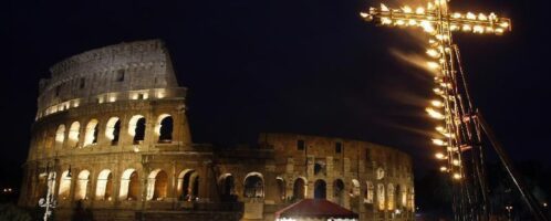 Cross in front of the Colosseum