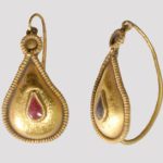 A pair of beautiful gold roman earrings