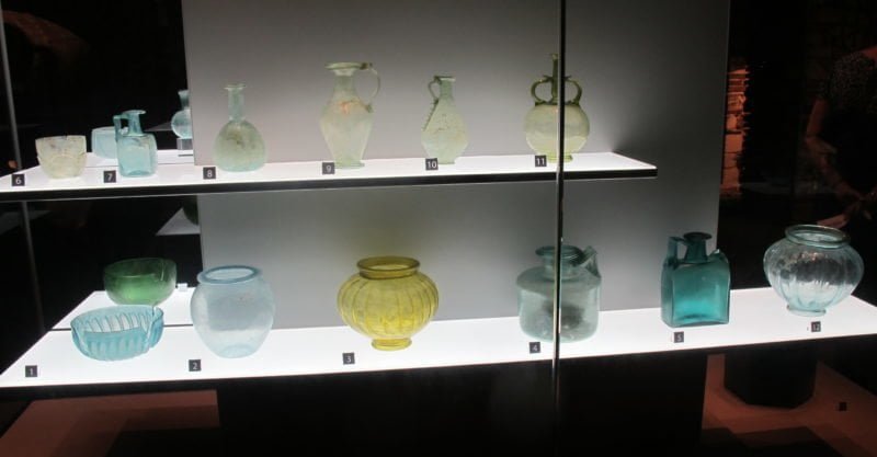 A collection of Roman glass vessels in the collection of the Colchester Castle Museum, erected on the foundations of Claudius' Temple