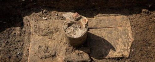 The preserved neck of the amphora - without a bottom - through which the  victim was placed directly into the grave