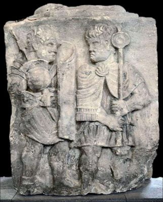 Roman relief showing the legionary and signifer on the march