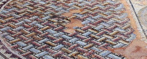 Floor mosaic with geometric patterns