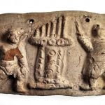 Relief rzymski ukazujący organy wodne i gladiatorów