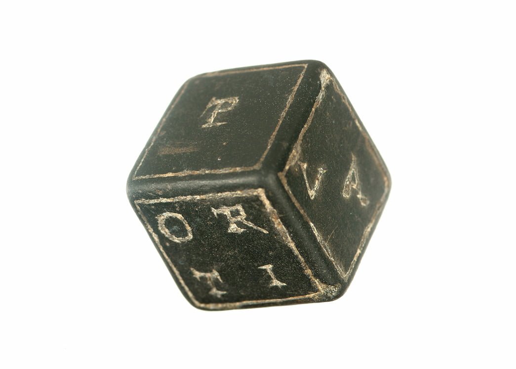 Dice with letter and word markings. Dated on the 2nd century CE