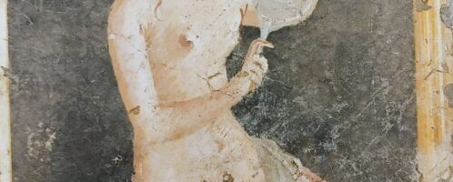 Roman fresco showing woman combing her hair