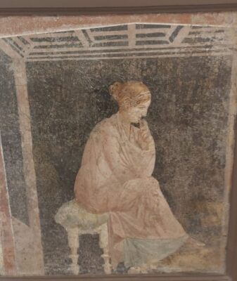 Rzymski fresk ukazujący zastanawiającą się kobietę