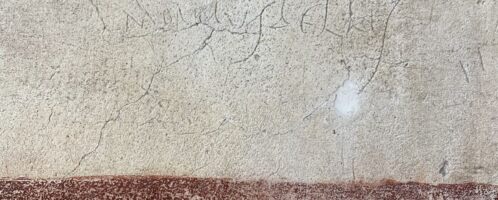 Napis wyryty na ścianie rzymskiego Domu Wettiuszów