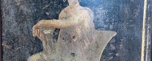 Roman fresco showing seated woman