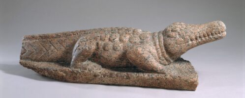 Ancient granite crocodile sculpture