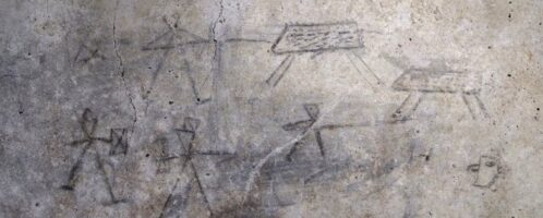 Scenes showing gladiators and hunters painted on wall of Roman house