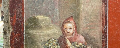 Fresco discovered in Pompeii showing child wearing hooded cloak