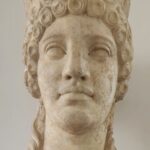 Sculpture of goddess with crown