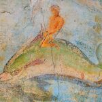 Fragment of Roman fresco depicting man riding dolphin