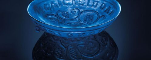 Beautifully decorated antique glass bowl with ancient Greek inscription