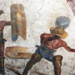 Fragment rzymskiego fresku przedstawiającego walkę dwóch gladiatorów